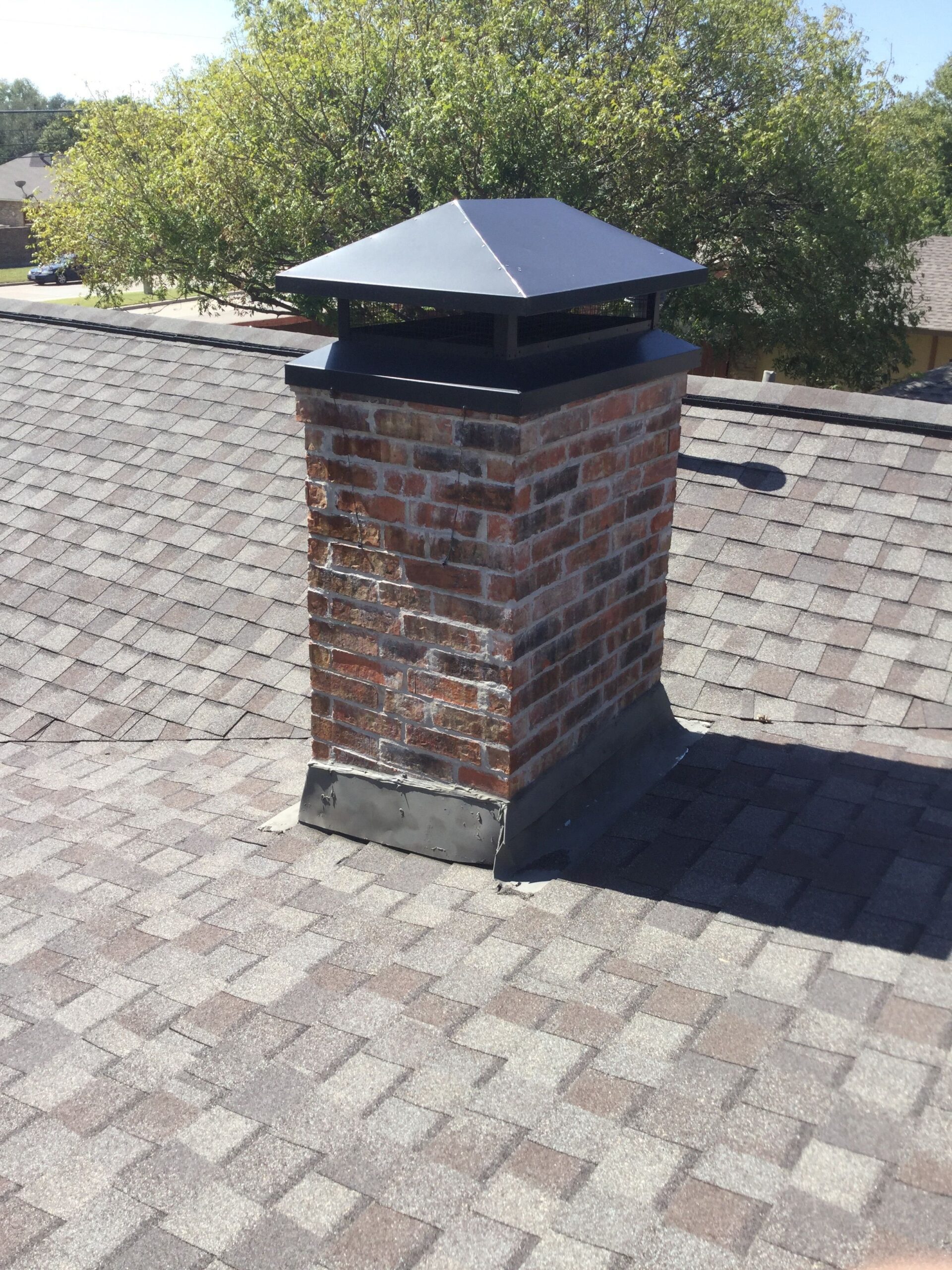 Professionally installed chimney cap protecting the chimney by S.O. Chimney Burlington
