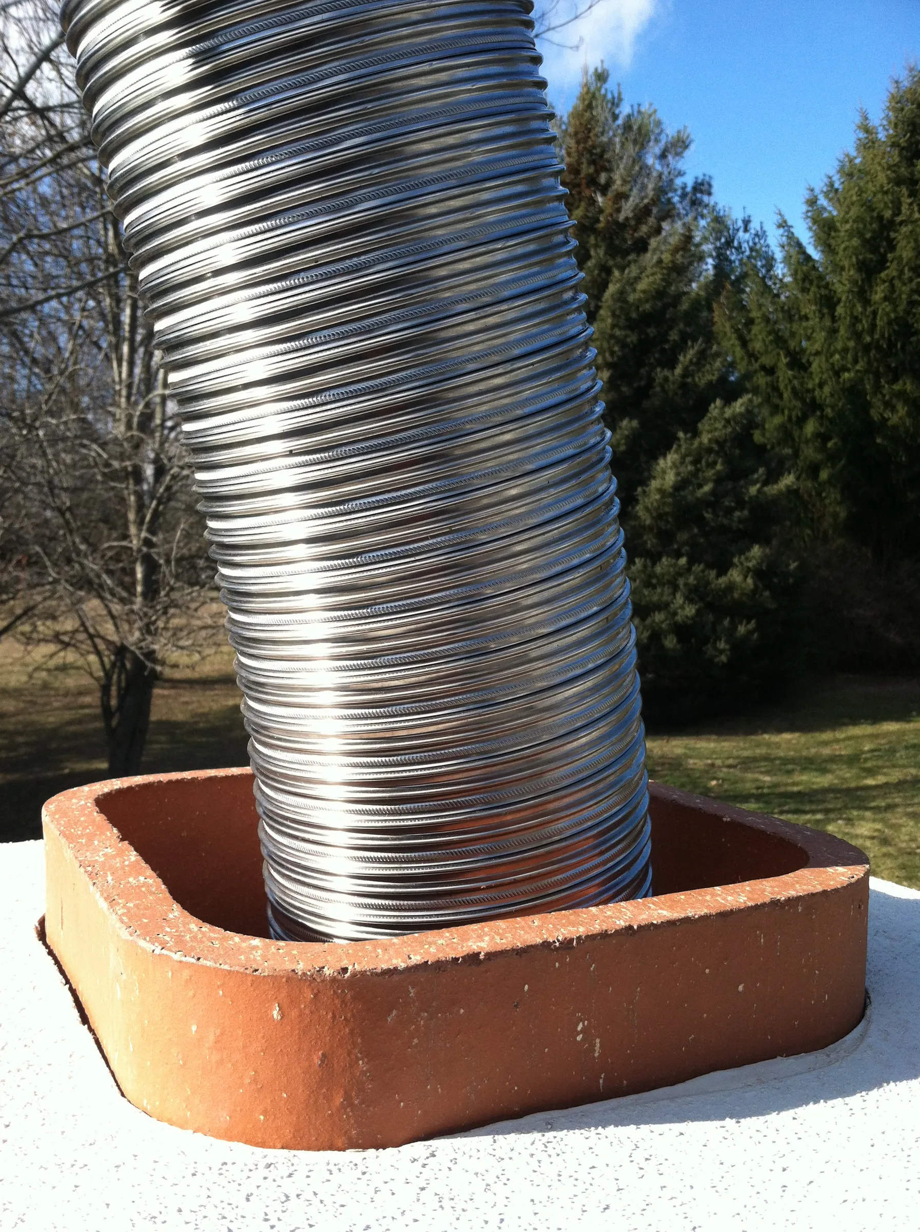 Damaged chimney requiring proper liner installation by S.O. Chimney Burlington