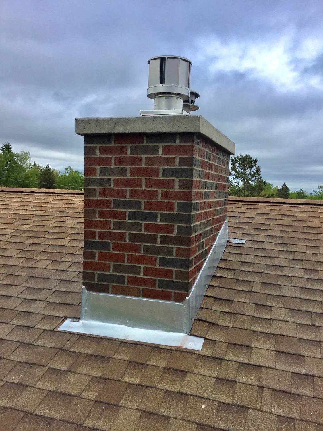 Professionally installed chimney liner protecting the chimney system by S.O. Chimney Burlington
